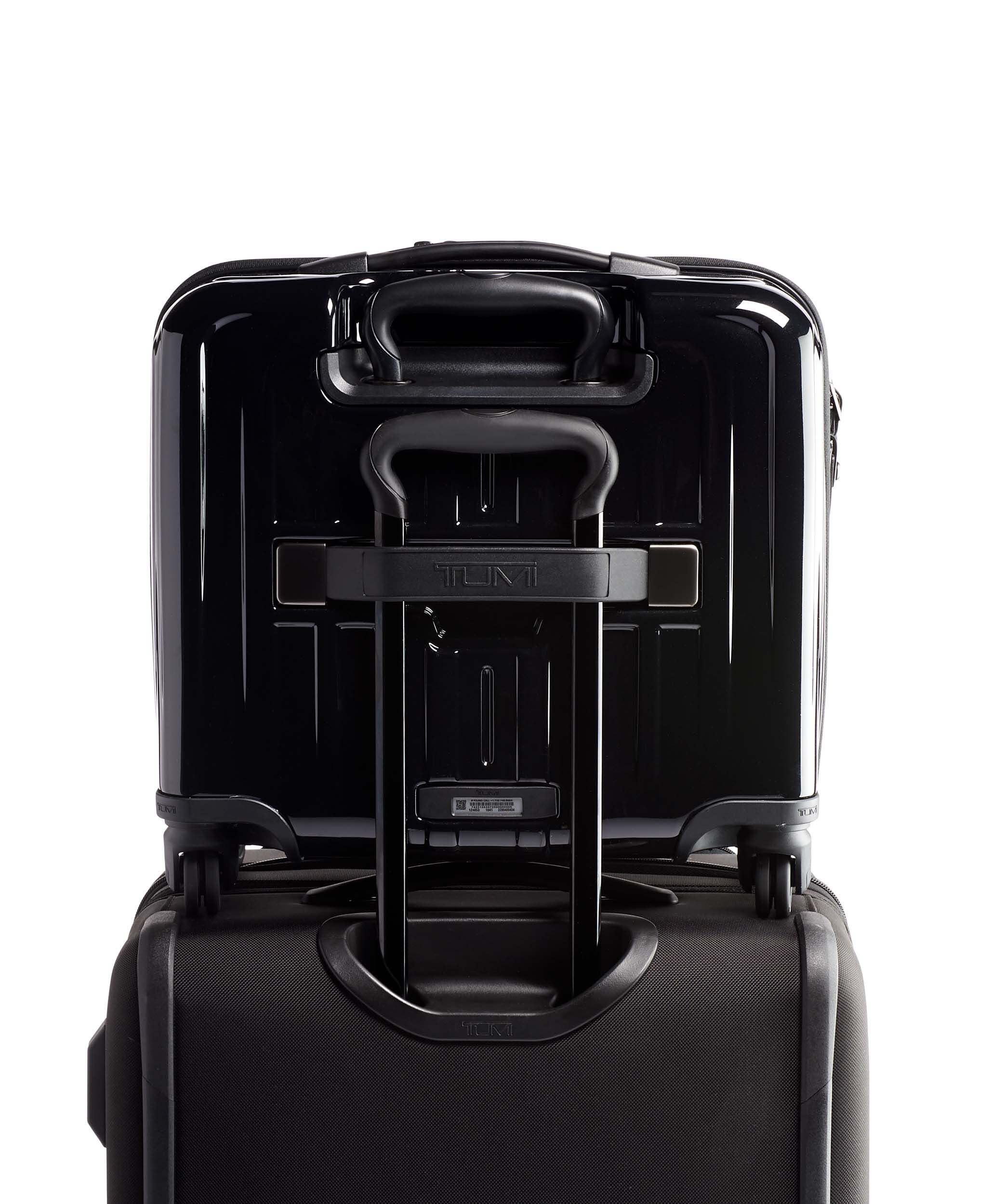 tumi 4 wheeled compact brief