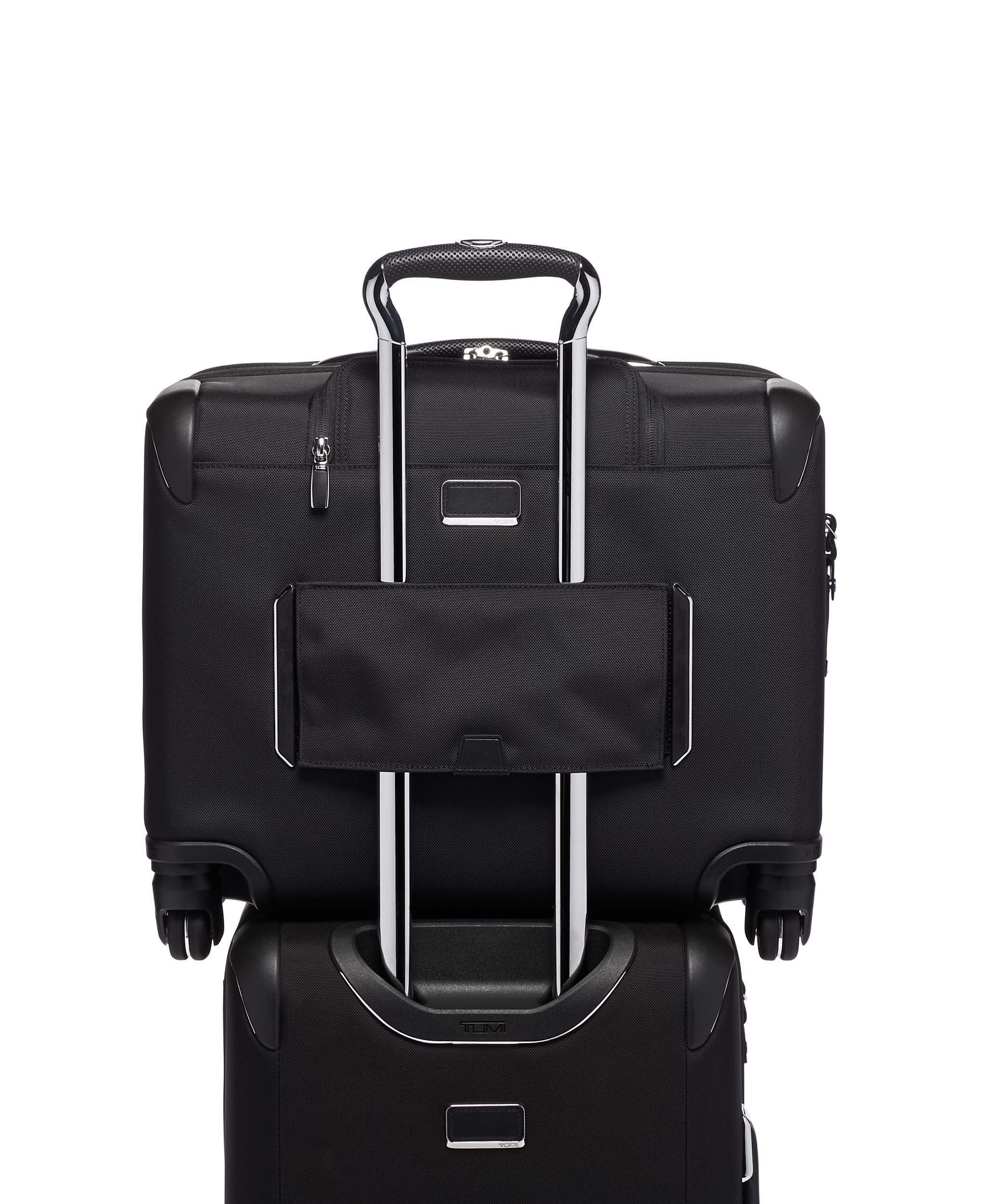 tumi 4 wheeled compact brief