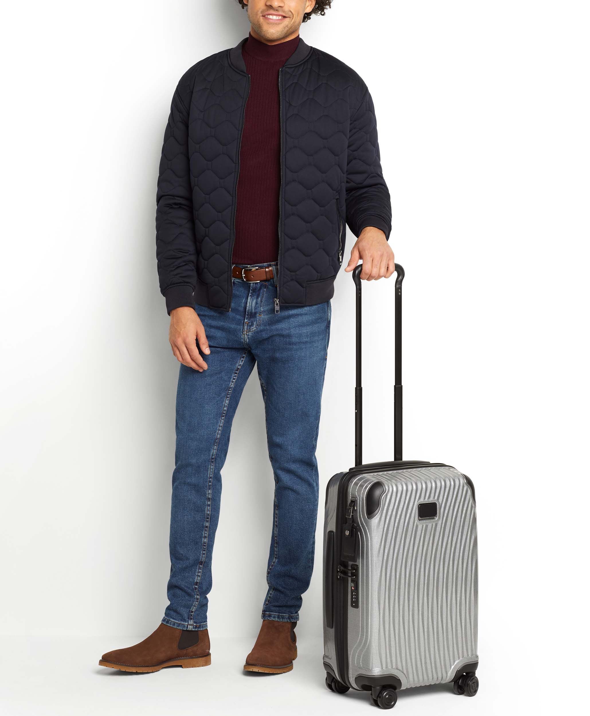 tumi arrive international carry on